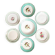 Old mismatched earthenware dinner plates accompanied by a deep dish