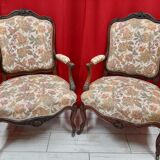 Paire de fauteuils style régence