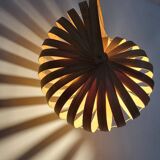 Nautilus shell-shaped chandelier made from bamboo slats