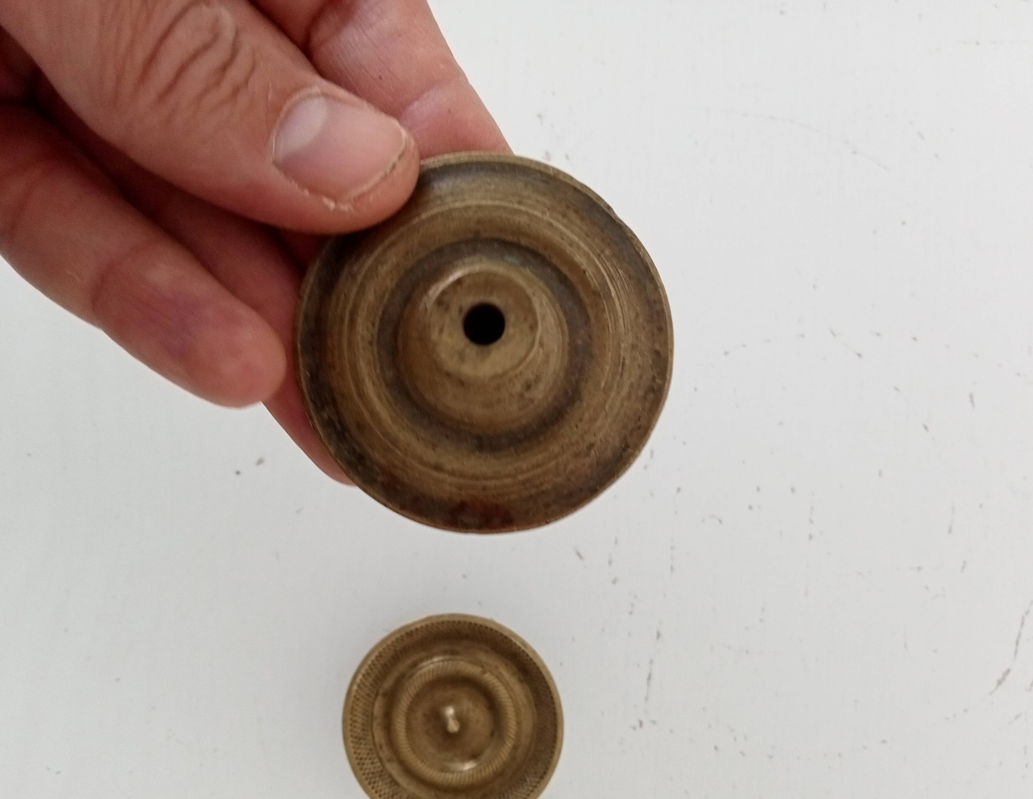 Pair of antique Empire furniture knobs in bronze from the 19th century.