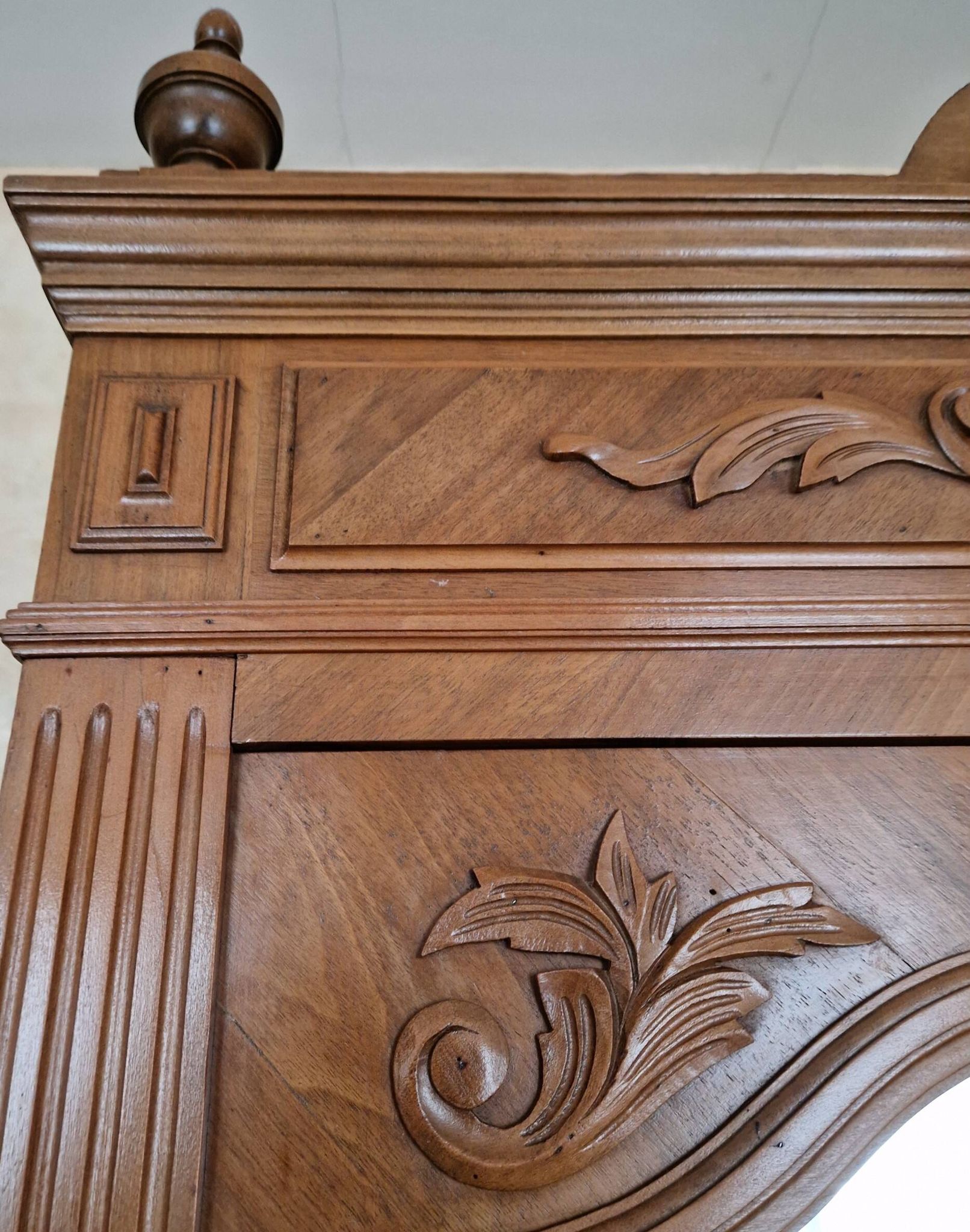 Large antique wardrobe in the Henri II style made of oak and walnut with bevelled mirrors.