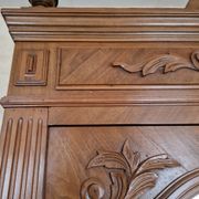 Large antique wardrobe in the Henri II style made of oak and walnut with bevelled mirrors.