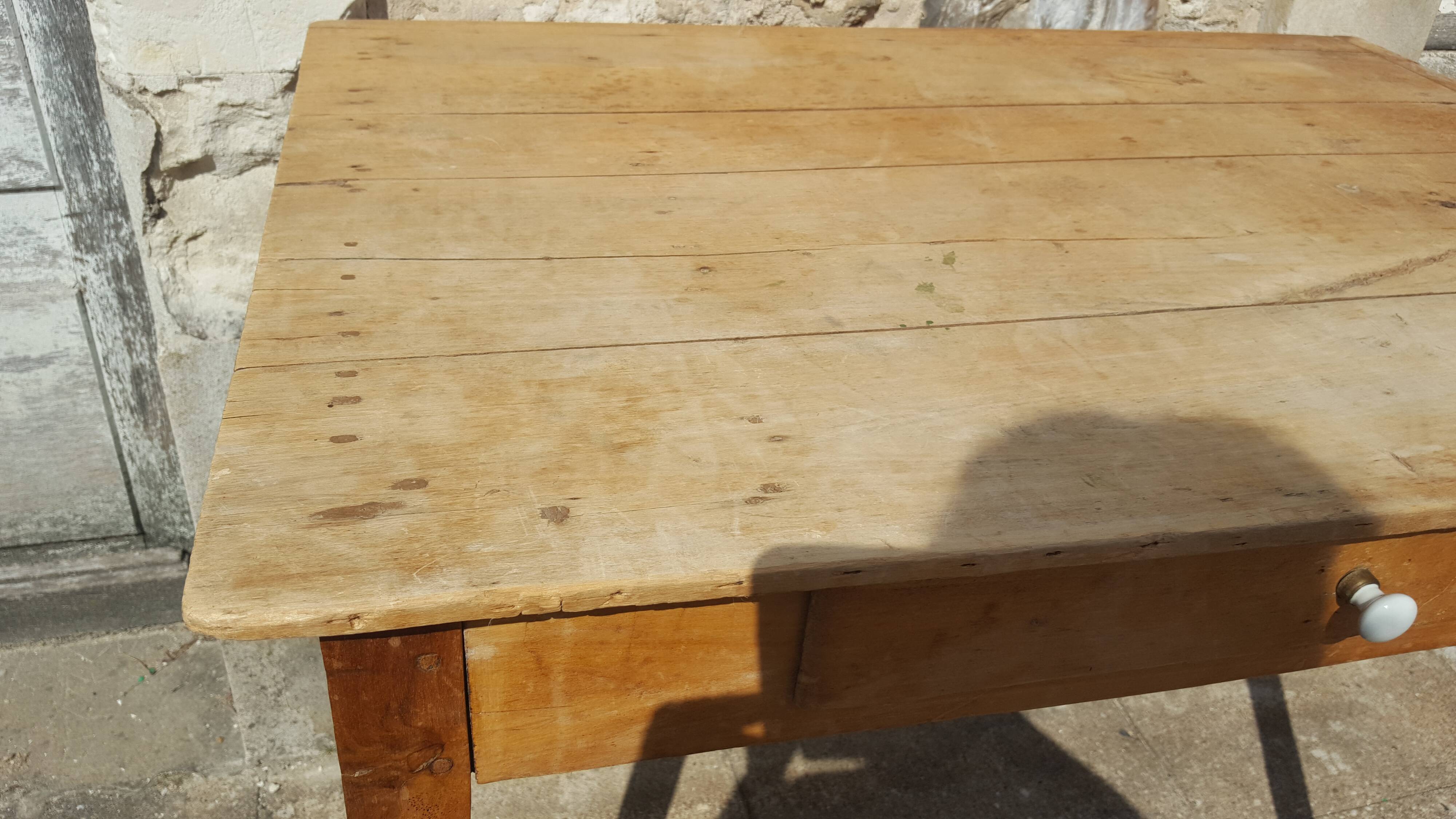 Raw wood farm table with drawer
