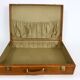 Ensemble de trois valises en cuir vintage