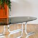 Oval coffee table in smoked glass and chrome, original double S design base, 1970.
