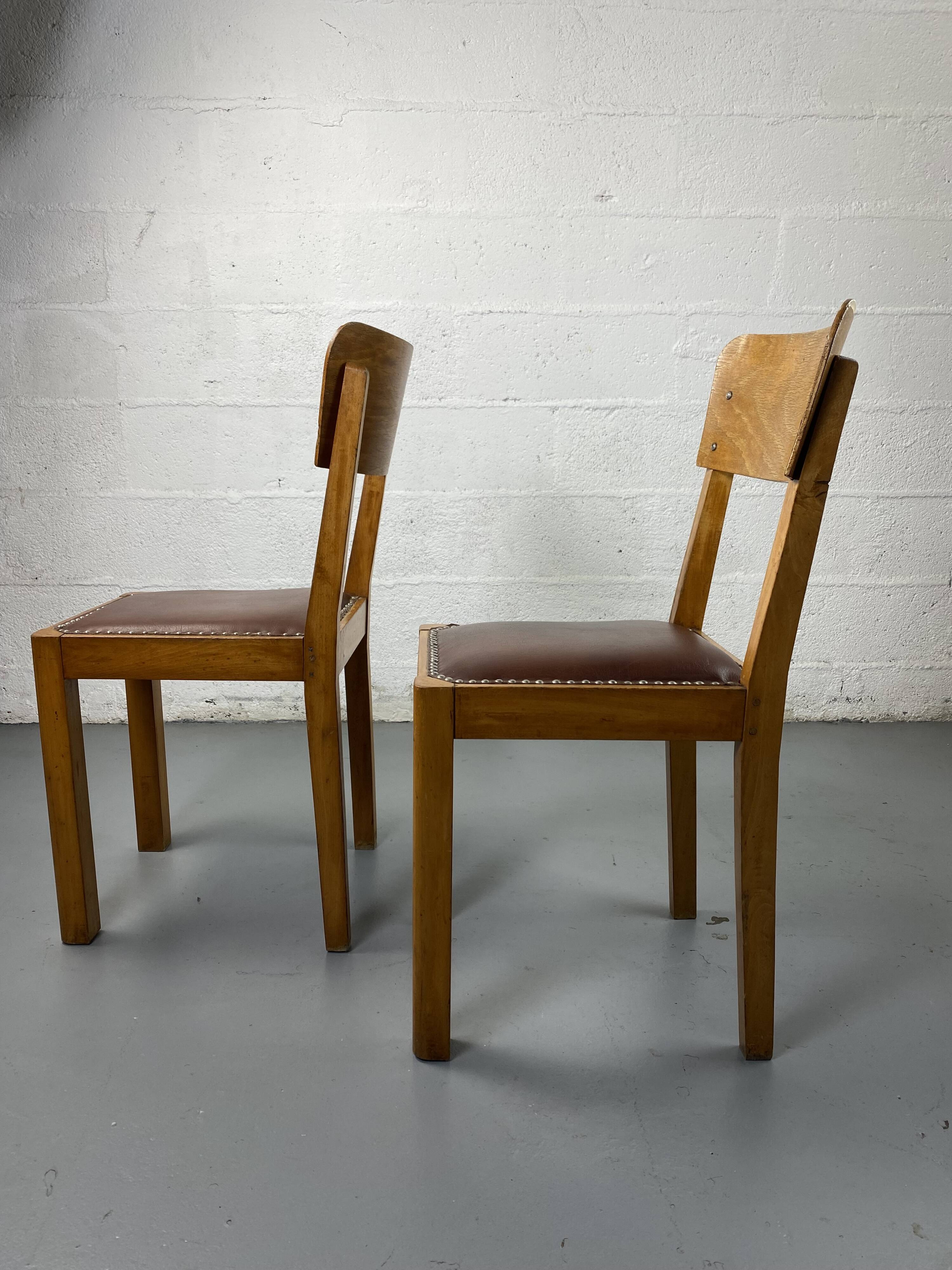 Wooden and leather chairs