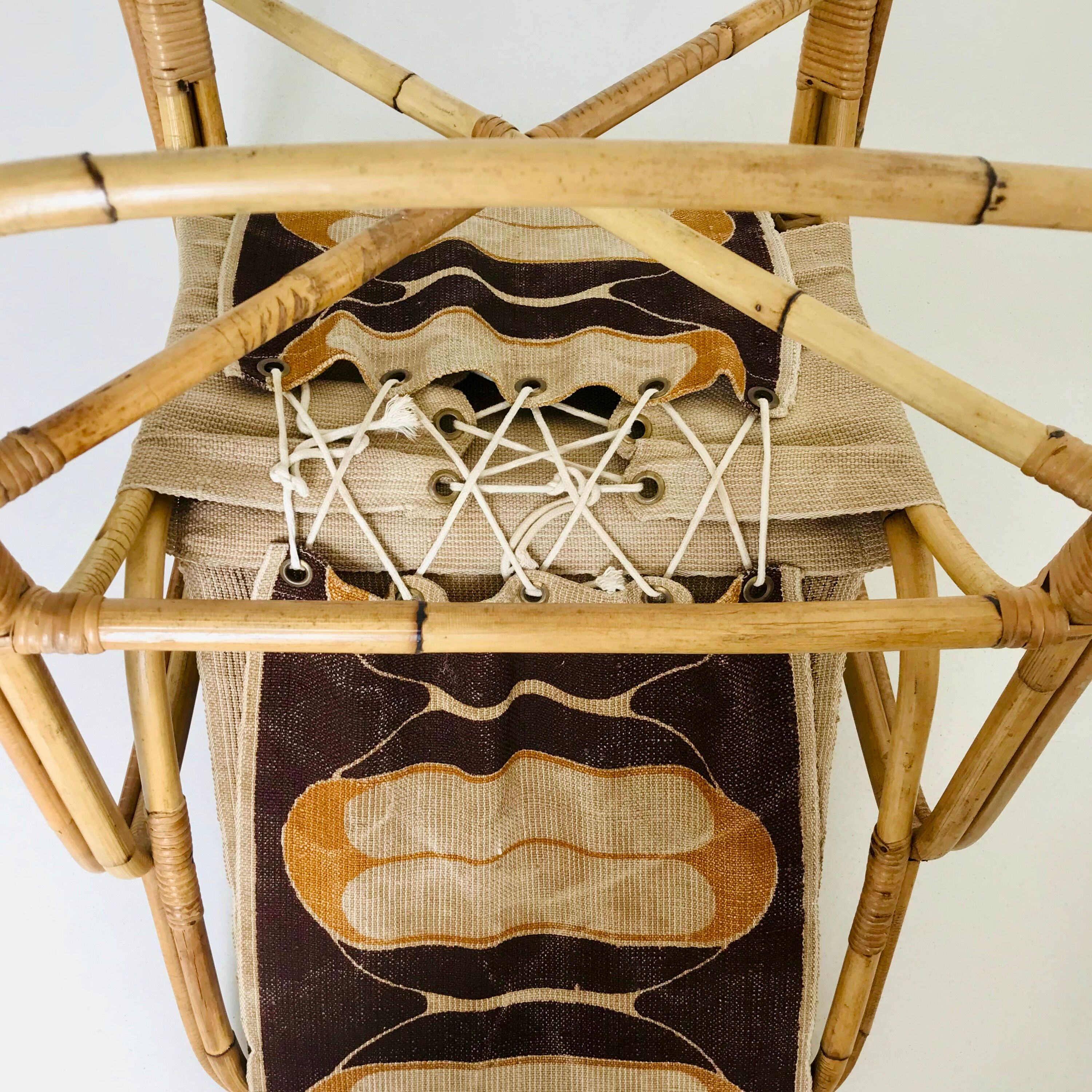 Rattan armchair and fabric, France 60s