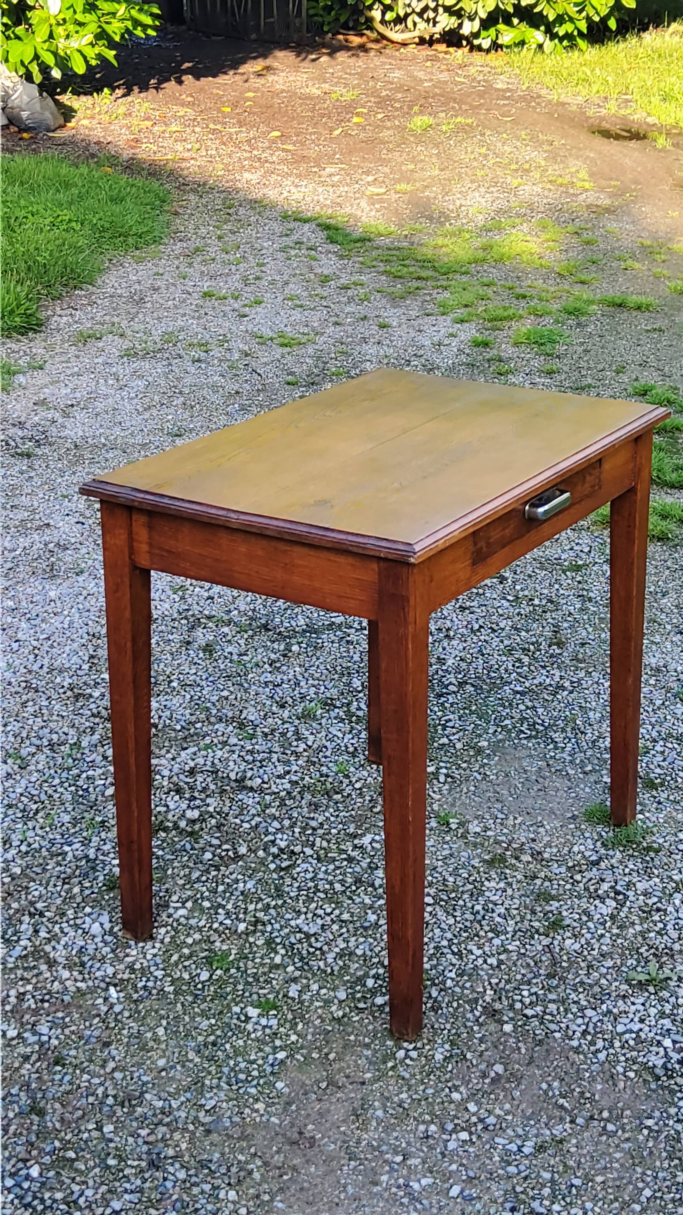 Oak writing table with spindle legs, early 20th century
