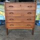 Danish commode from the 1960s in brown teak, with 4 drawers and elegant tapered legs.