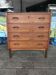 Danish commode from the 1960s in brown teak, with 4 drawers and elegant tapered legs.