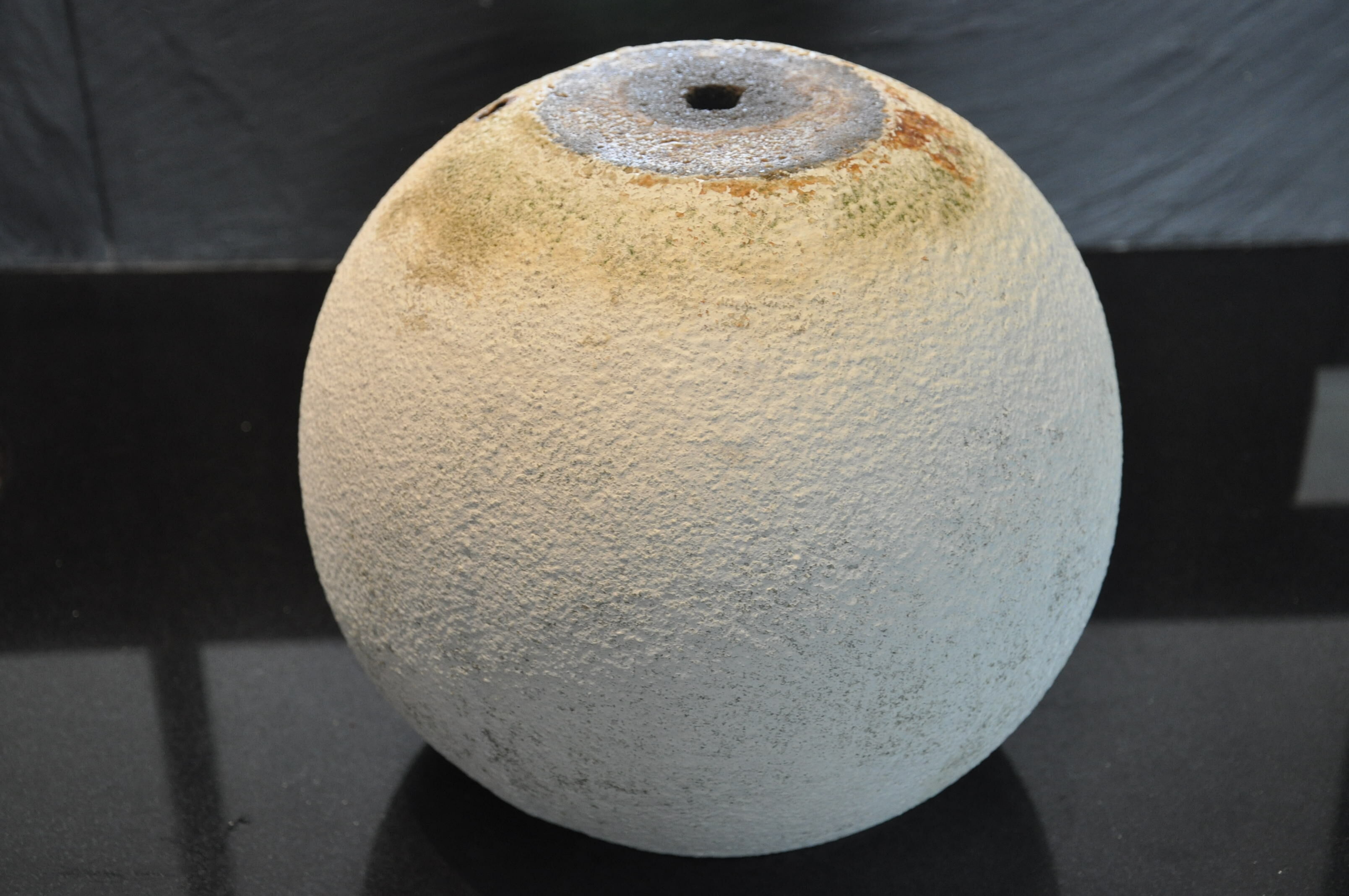 Cement ball planter from the 1960s
