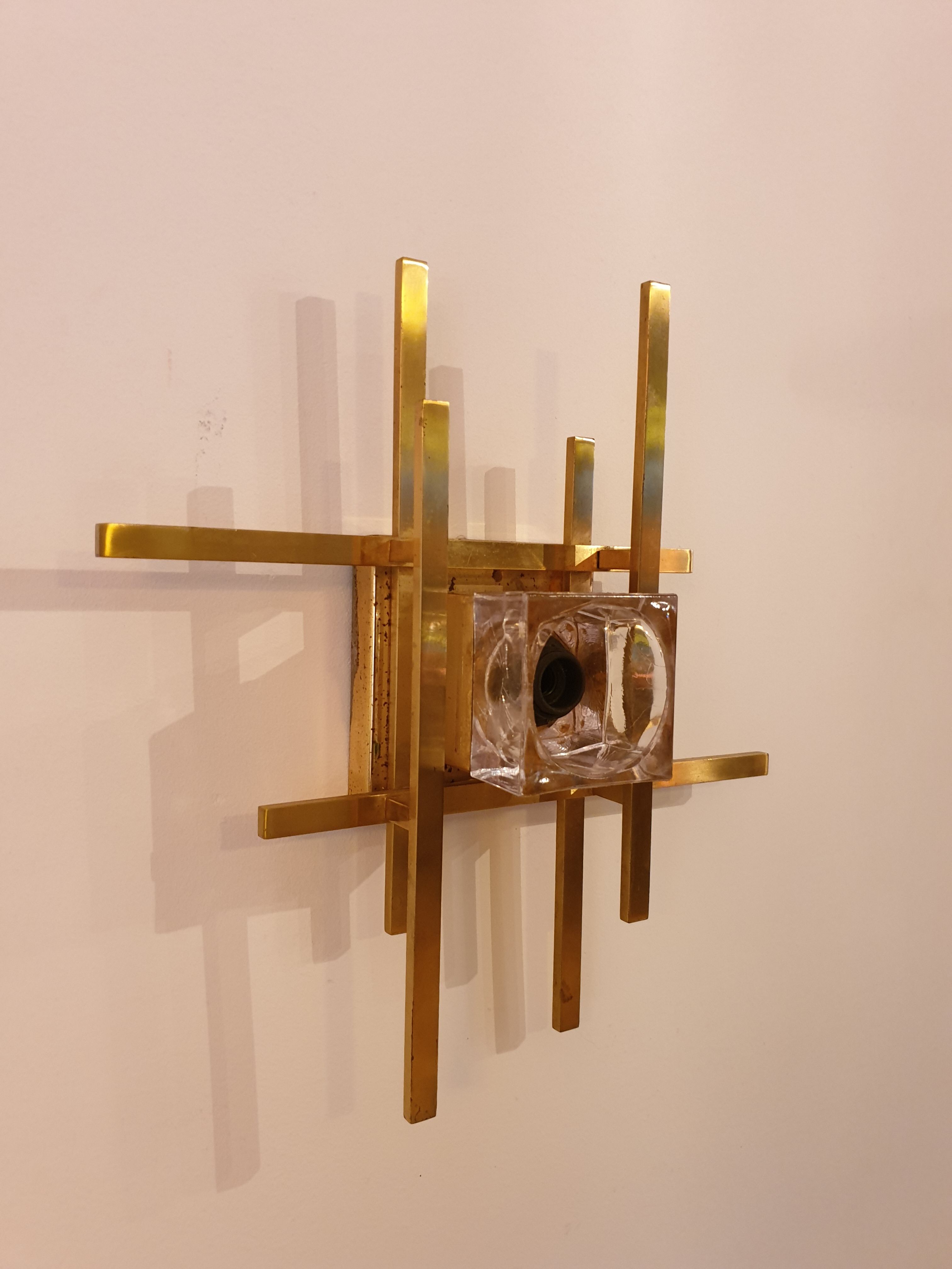 Pair of brass wall lamps from Sciolari