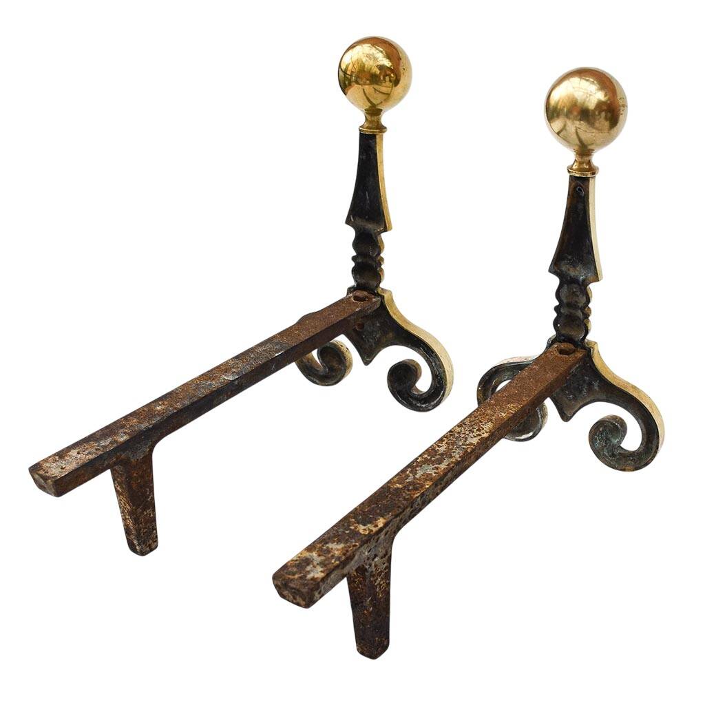 Gilded bronze andirons with rounded ball and patterns, antique fireplace accessory