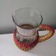 Glass and raffia water carafe