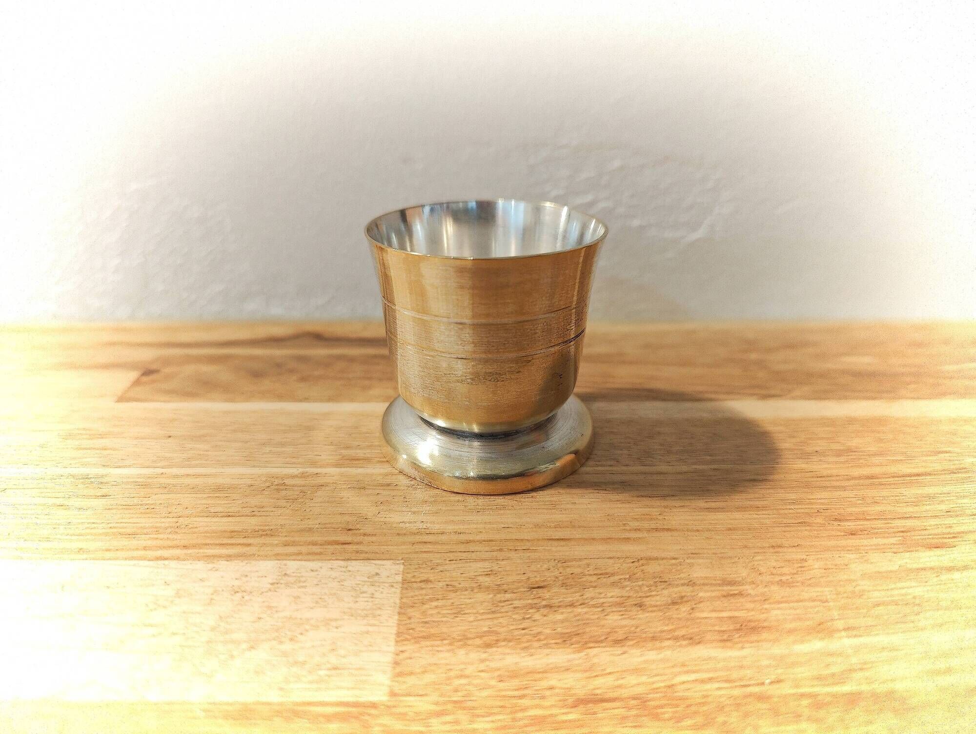 Antique egg cup in silver-plated metal
