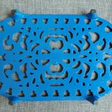 Dessous de plat en fonte