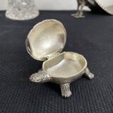 Ancient tortoise in silver metal