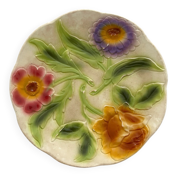 Antique slipware plate with 3 flowers