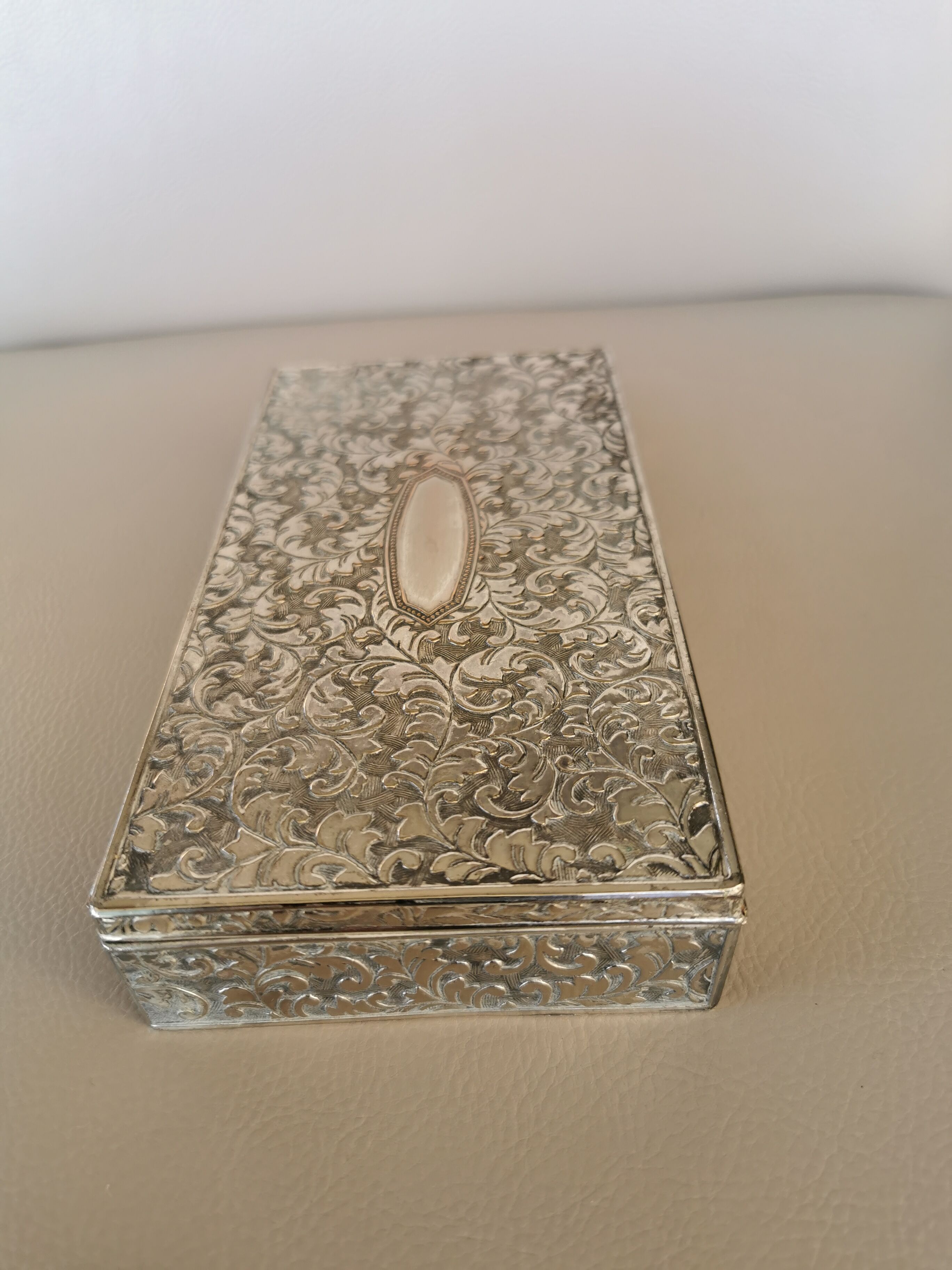 Old box in chiseled silver metal