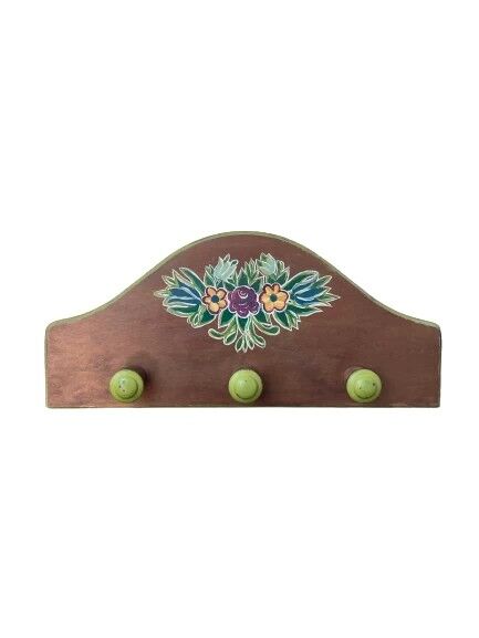 The wooden coat rack with floral motif
