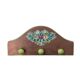 The wooden coat rack with floral motif