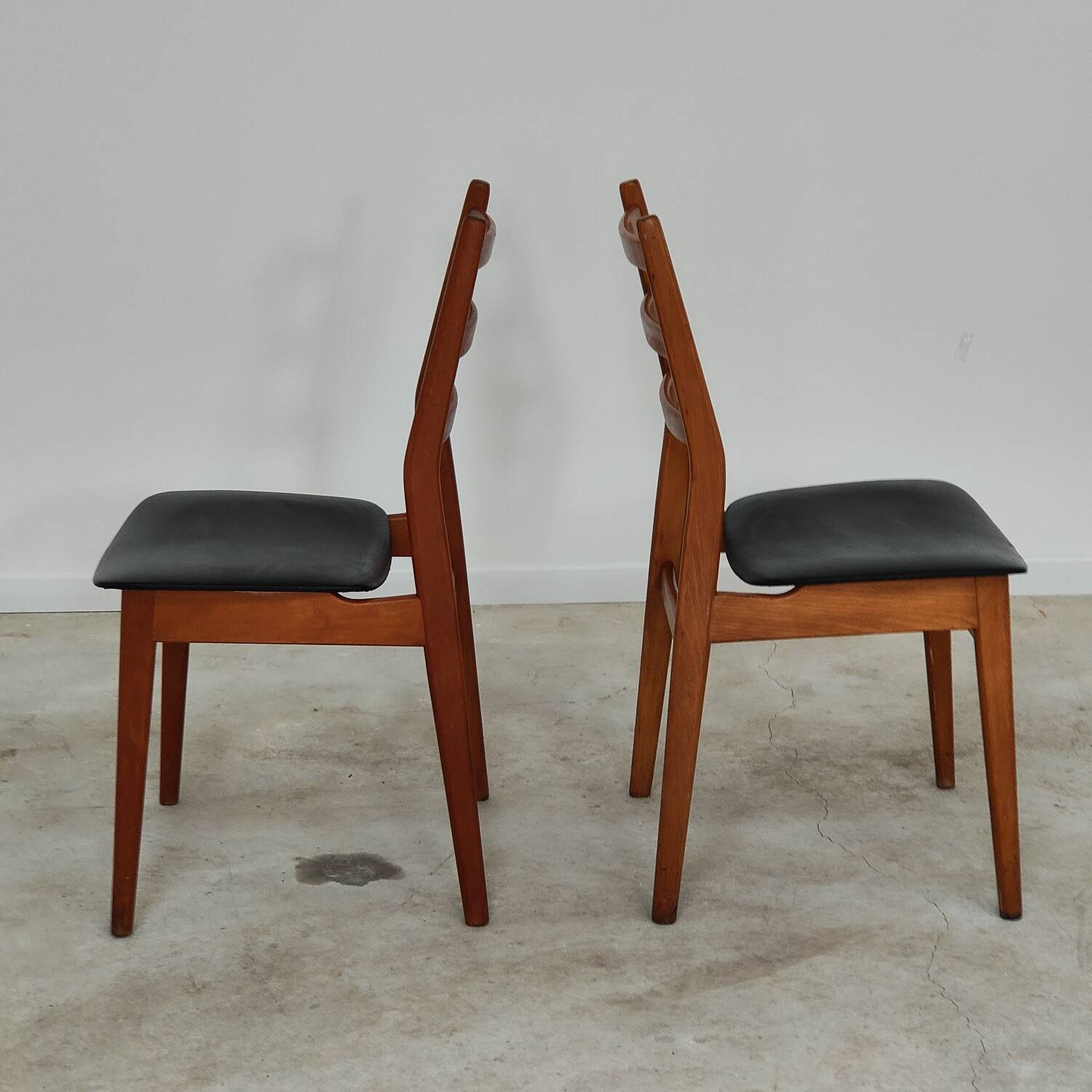 Pair of Scandinavian style leather and wood chairs 1970