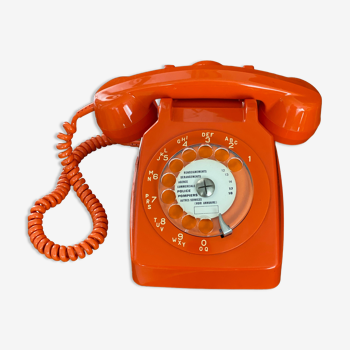 Vintage orange dial phone
