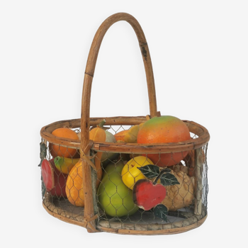 Vintage “rattan” basket filled with fruits