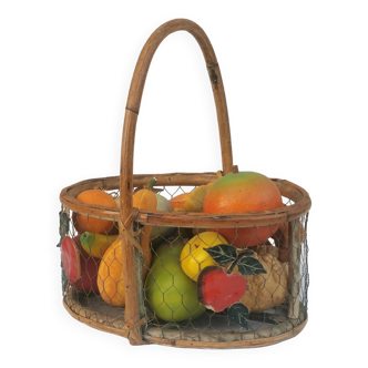 Vintage “rattan” basket filled with fruits