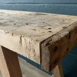 Old workbench with inclined legs