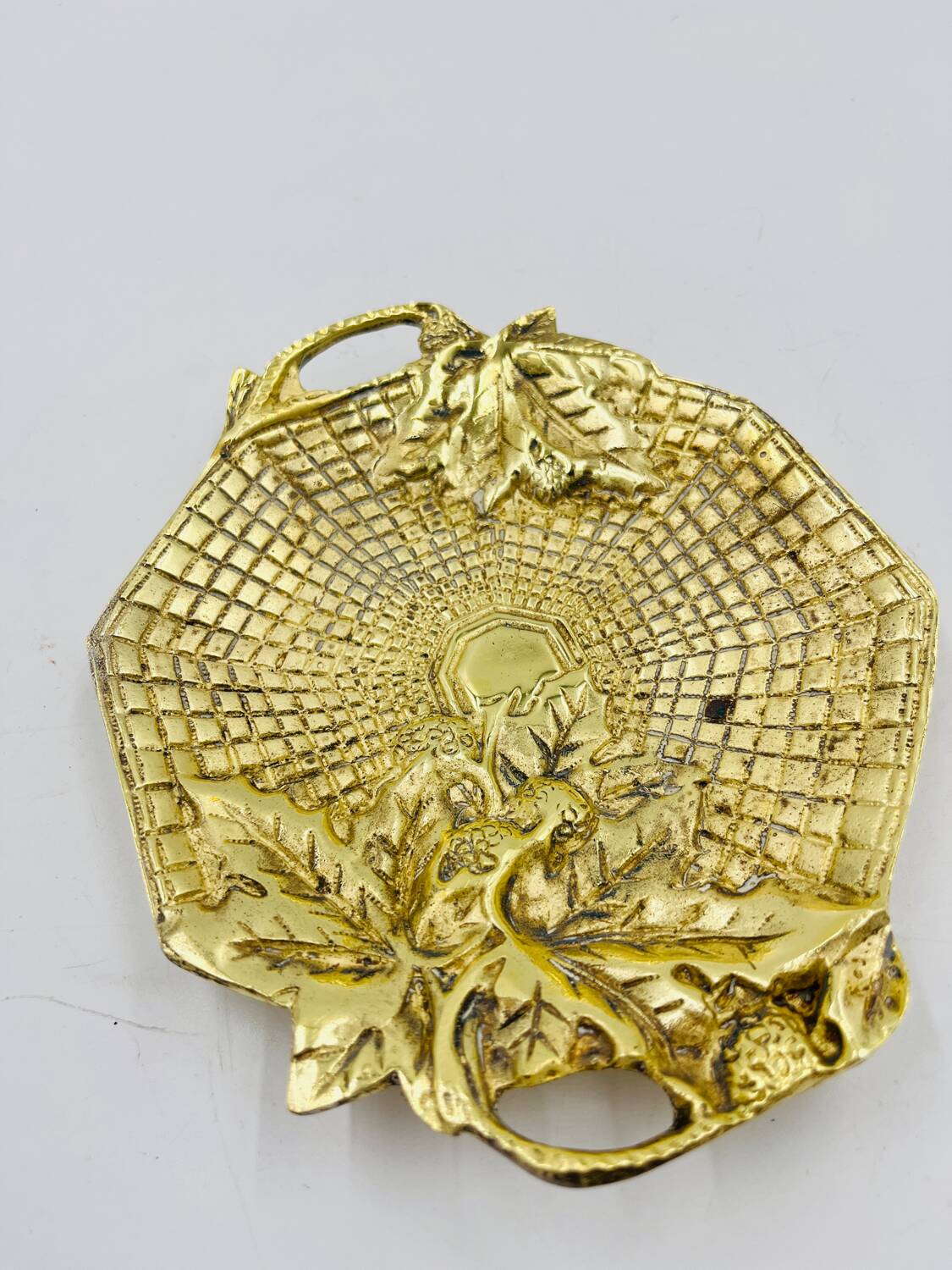 Art deco pocket emptier