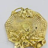 Art deco pocket emptier
