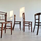 Mismatched wooden bistro chairs