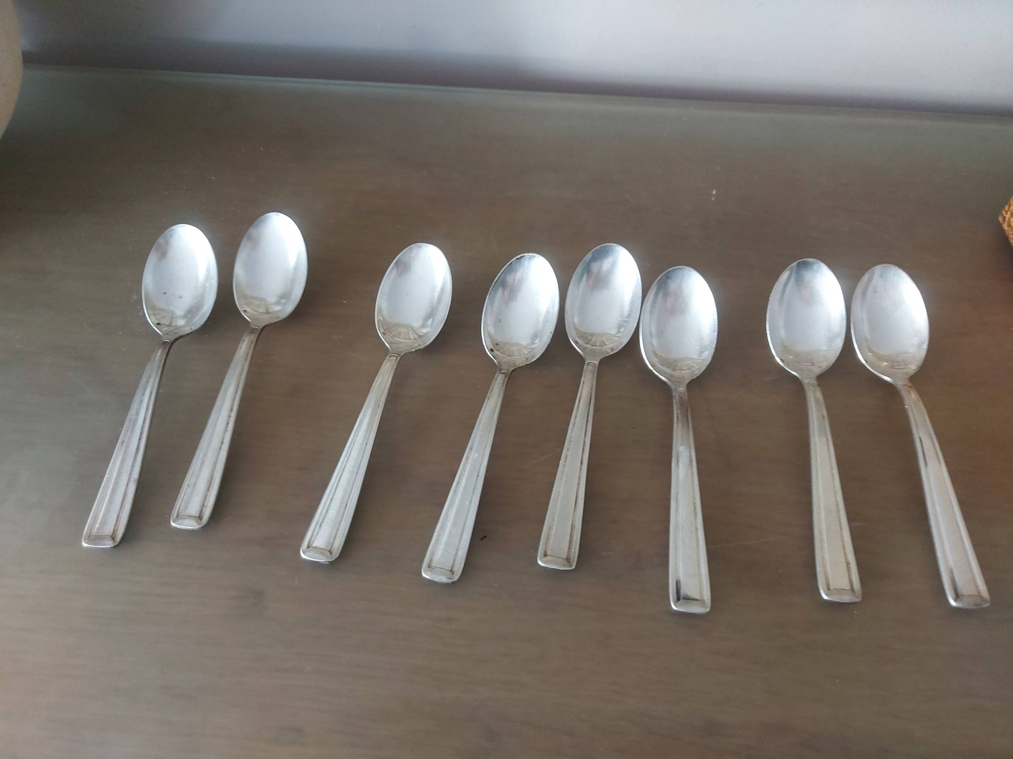 Coffret de 8 cuillères art déco en métal argenté