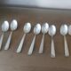 Box of 8 small art deco spoons in silver metal