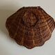 Empty corrugated shell pocket in wicker basket makers