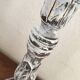 Large candlestick in white patinated wood.