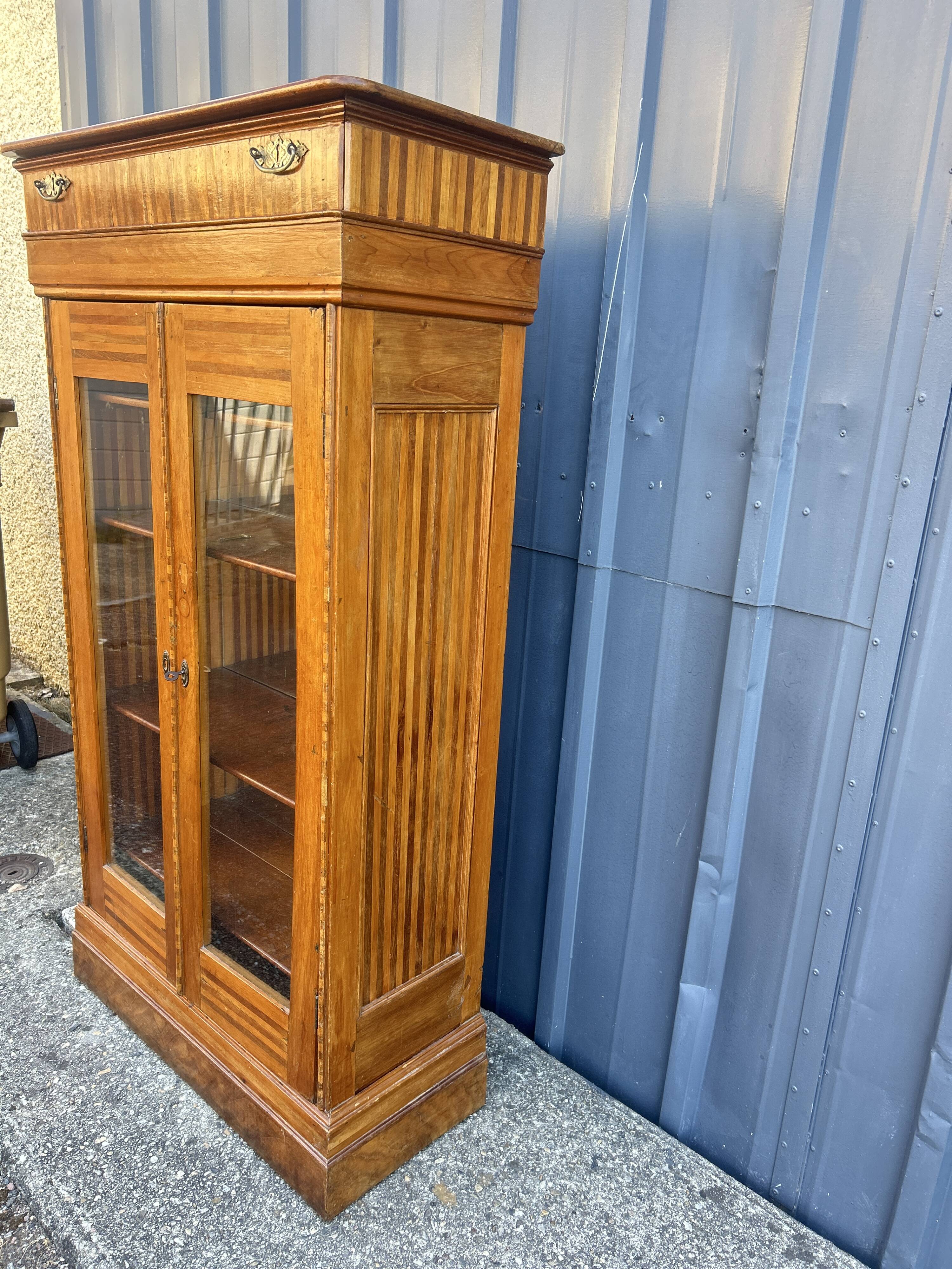 Two-door mahogany display cabinet