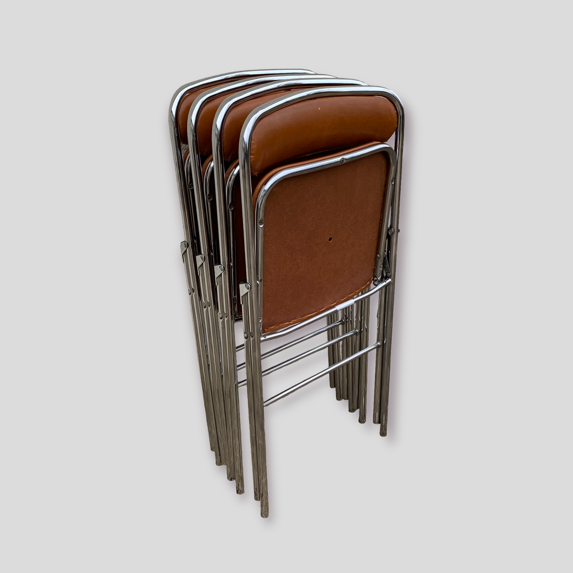 4 folding chairs chromed metal and Skaï fawn 1970