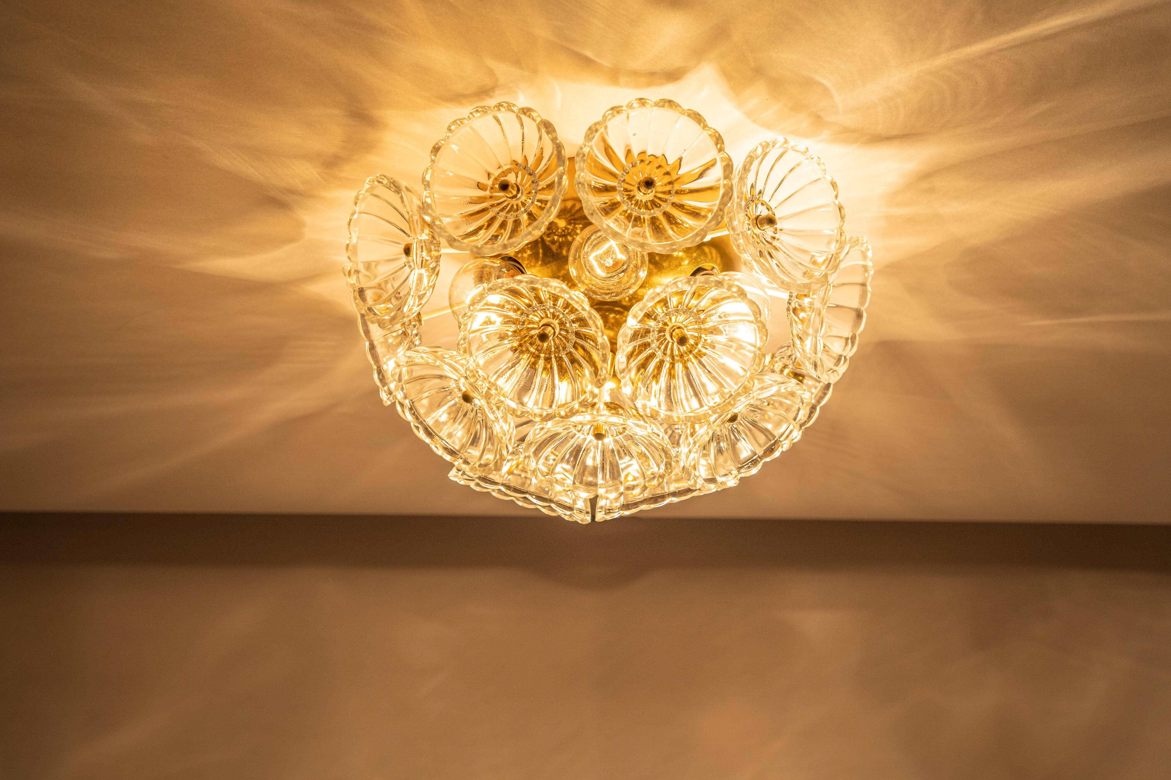 Sputnik ceiling light in floral glass and brass, Germany, 1960s.