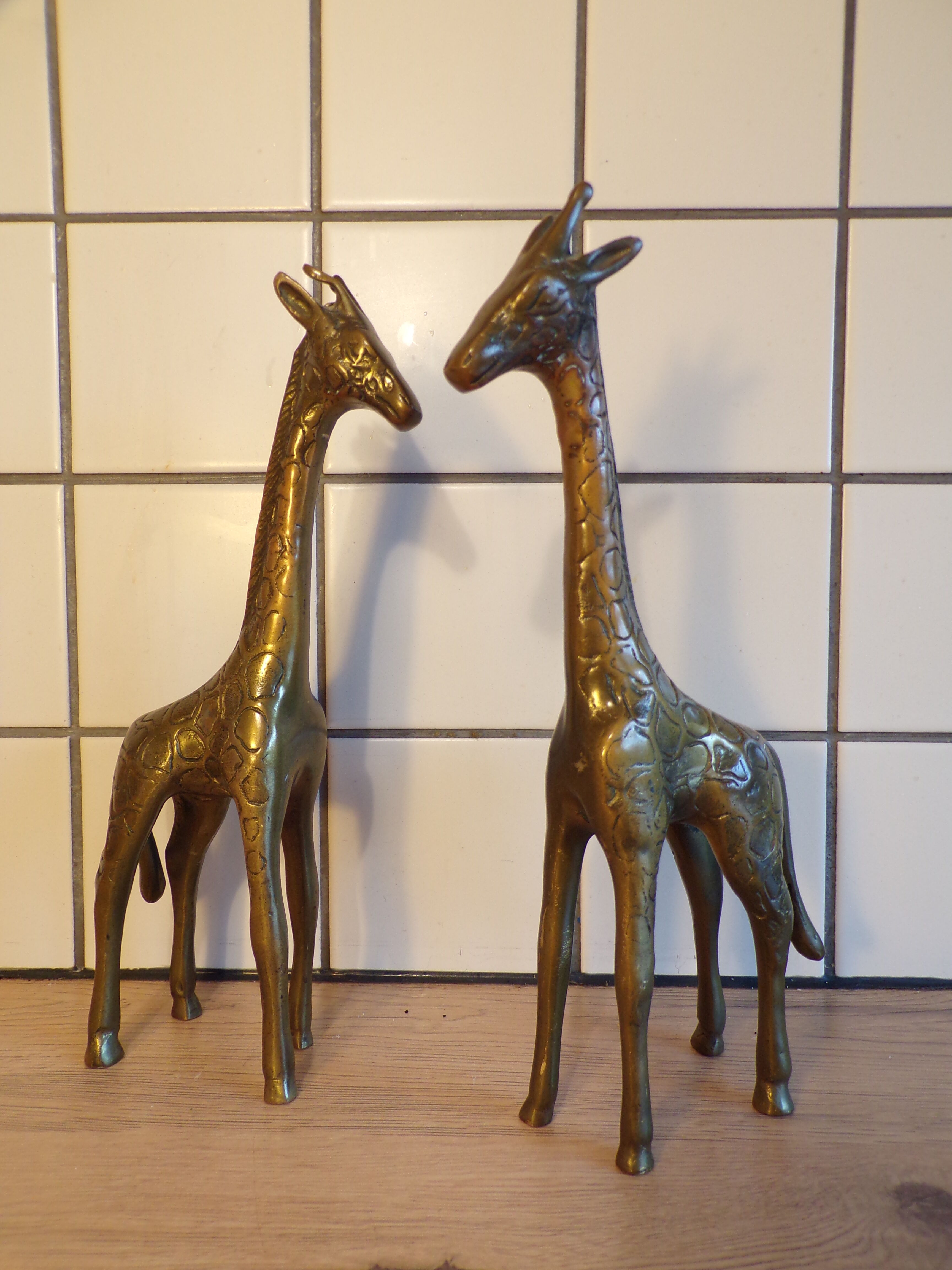 Pair of brass giraffes