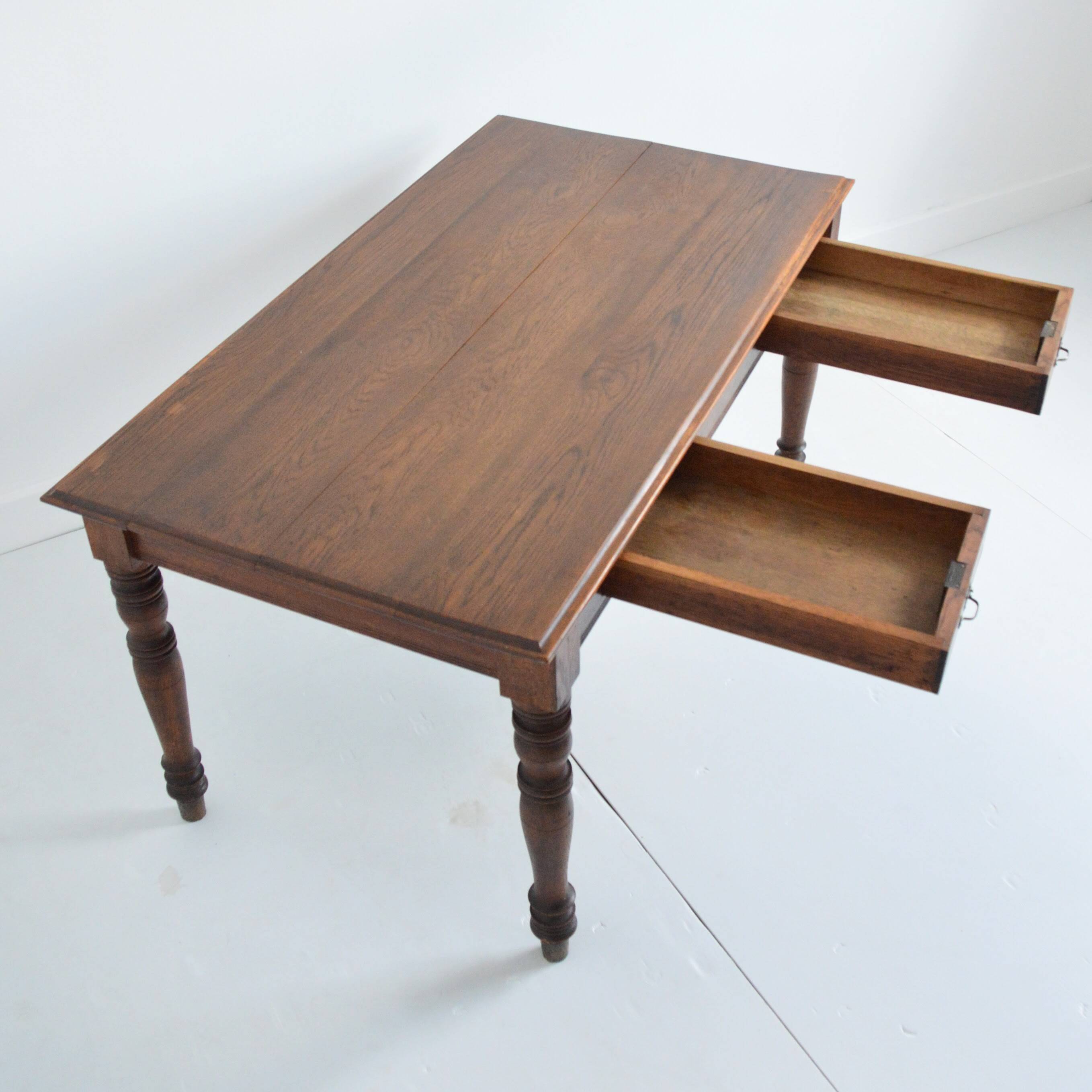 Farm table with extensions from the early 20th century.