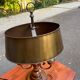 Hot water bottle lamp in solid wood and gilded bronze