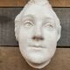 Statue murale visage plâtre