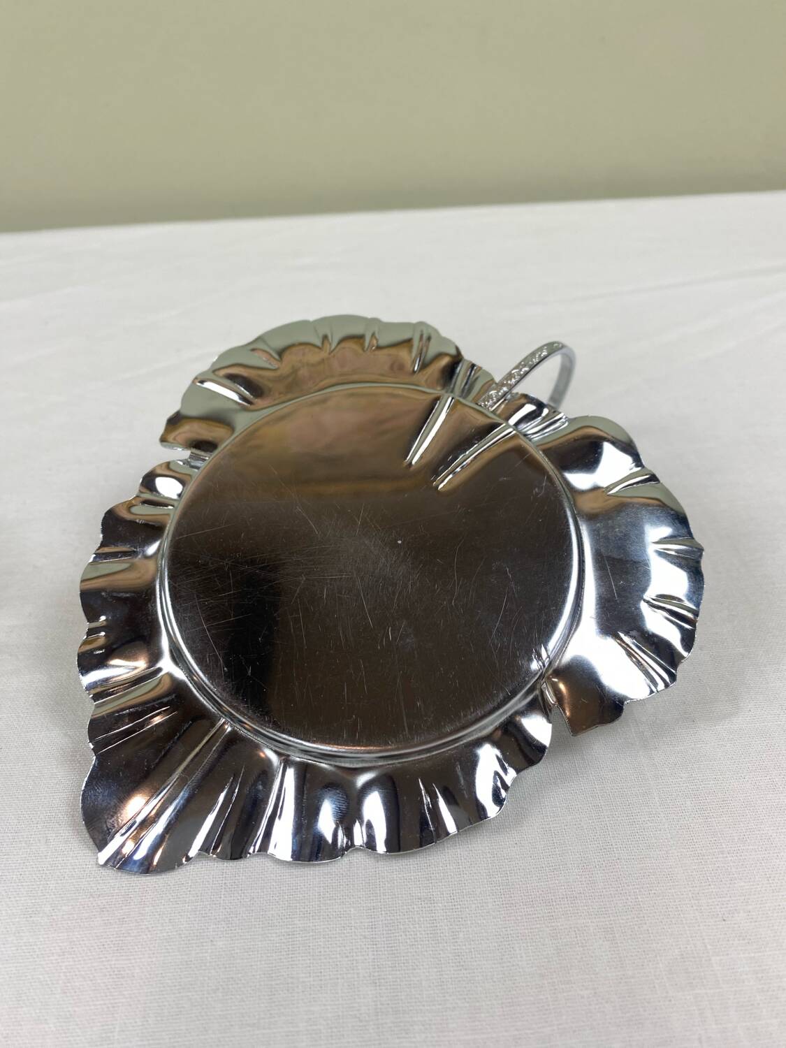 Metal and glass bowl