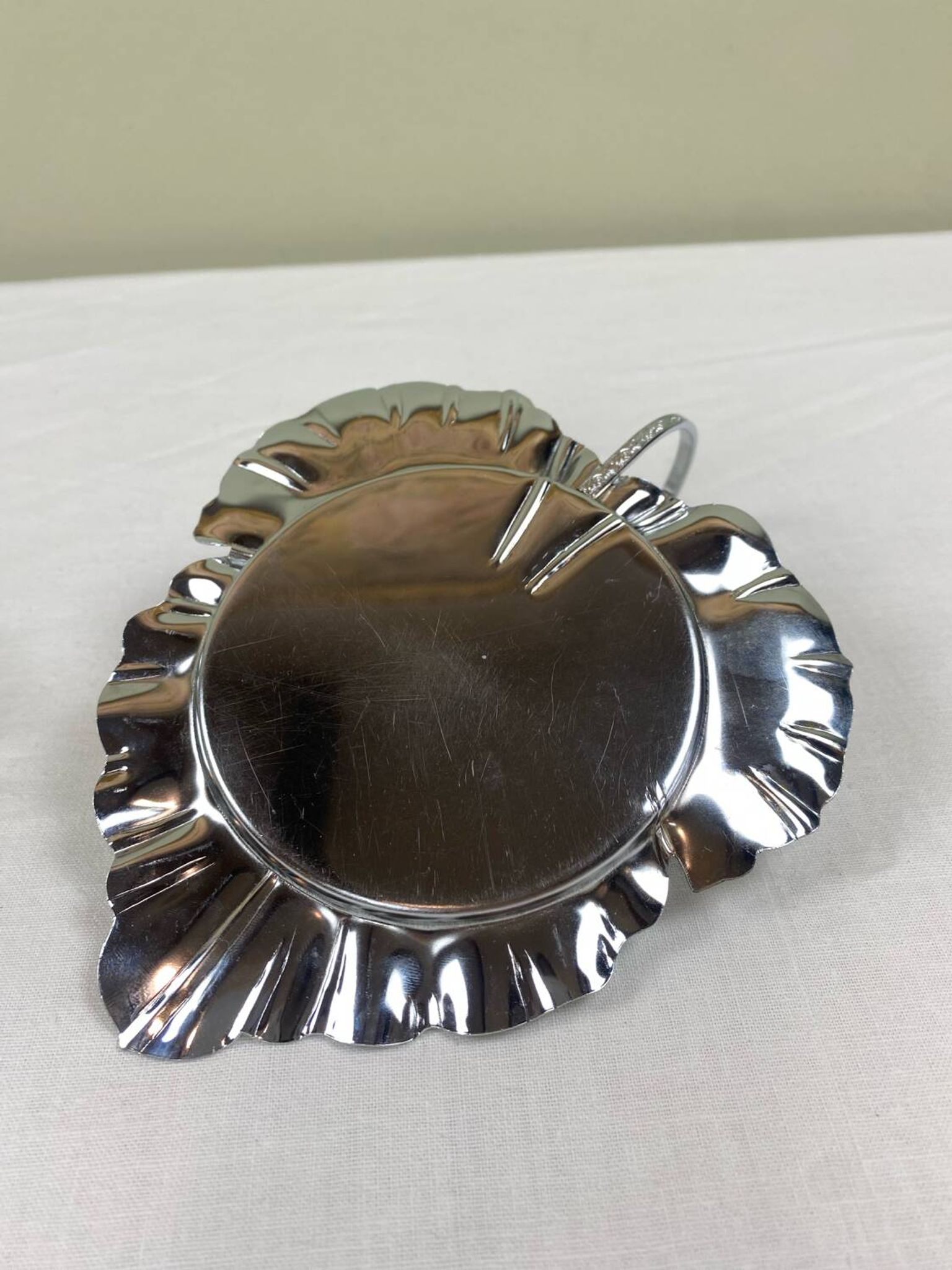 Metal and glass bowl