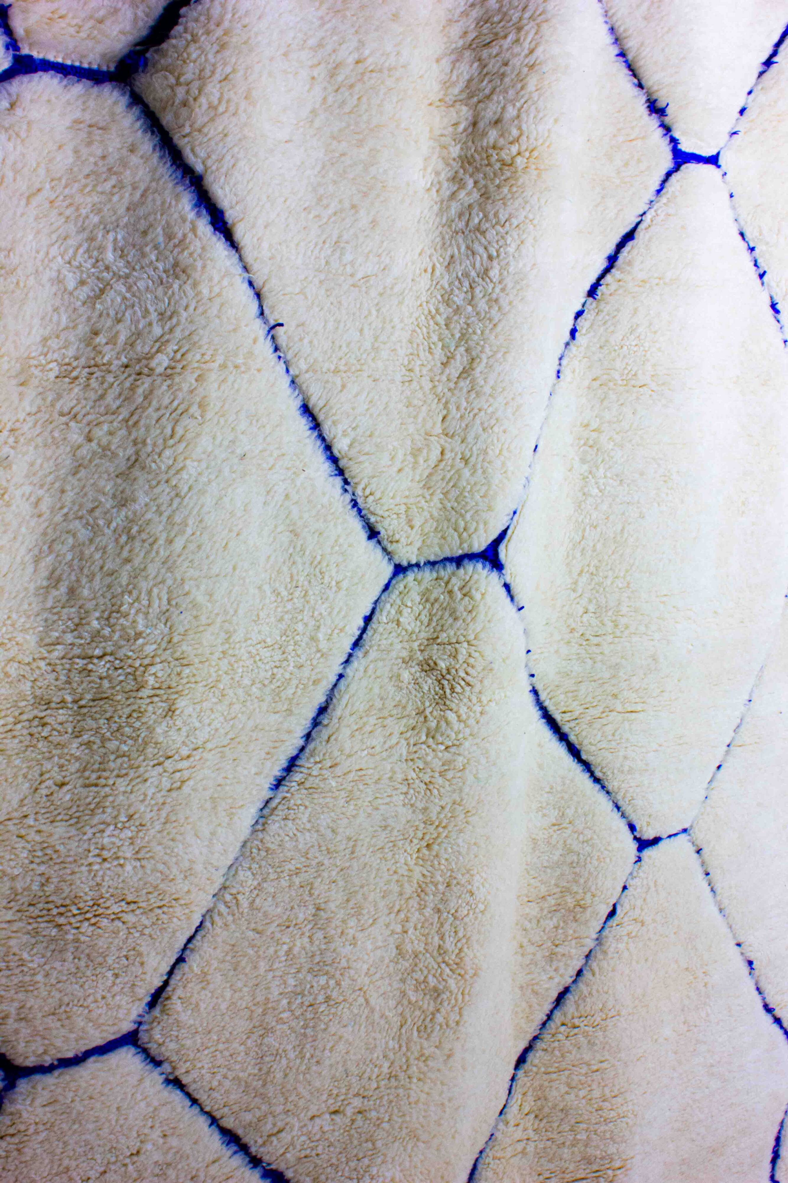 Vintage berber rug in ivory and blue wool