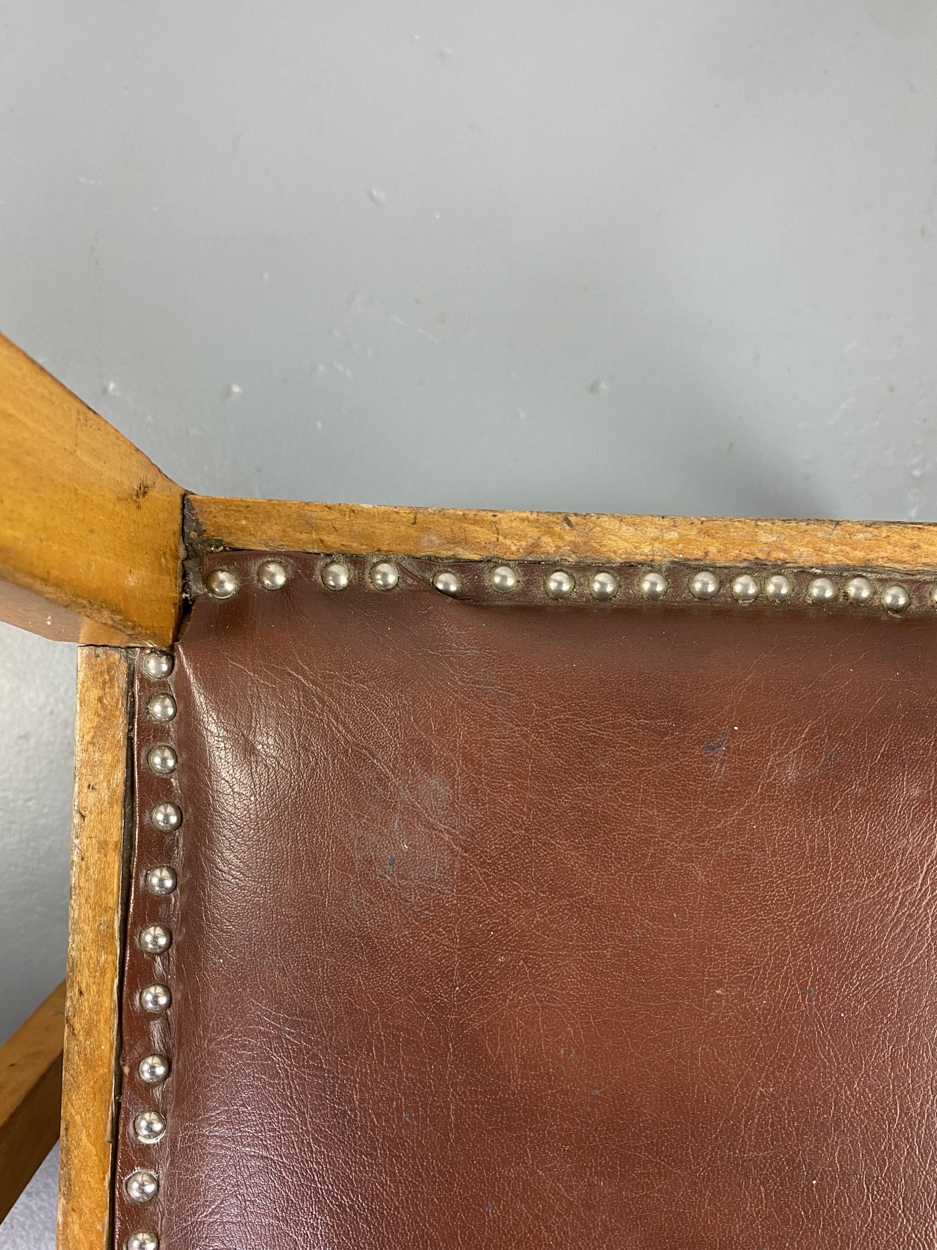 Pair of wooden and leather chairs