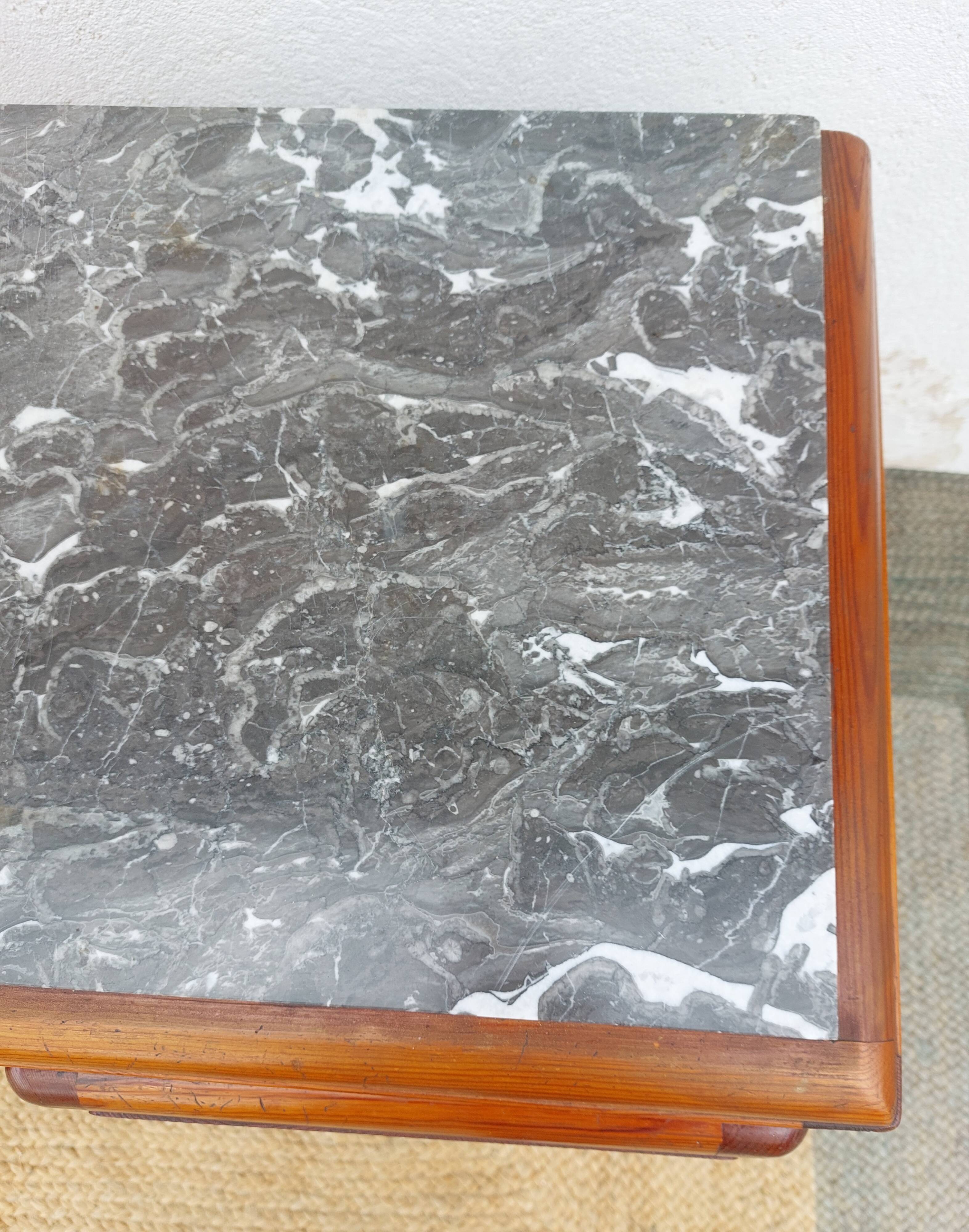 Mado buffet, marble top and asymmetrical doors.