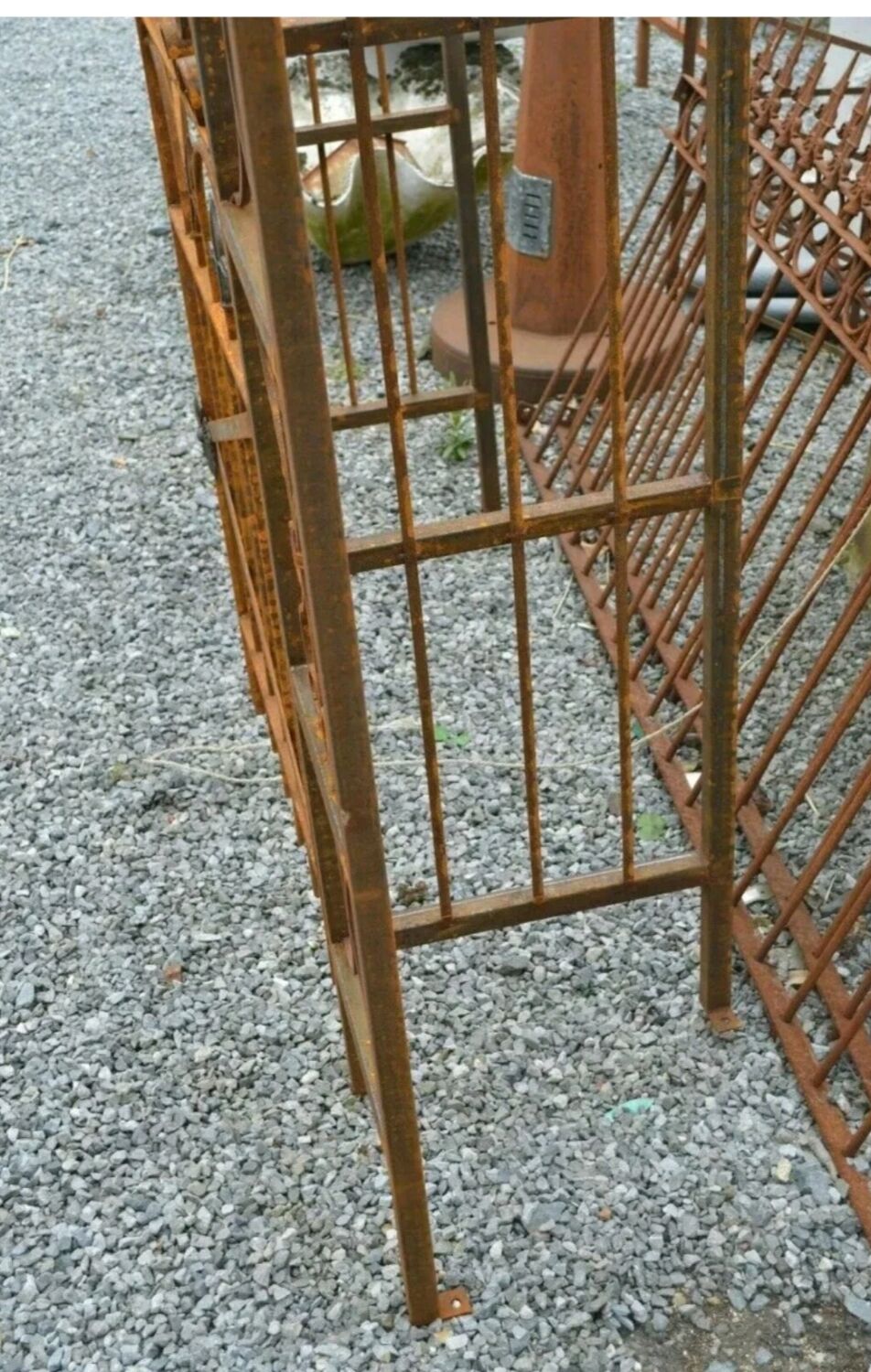 Garden arch with wrought iron gate